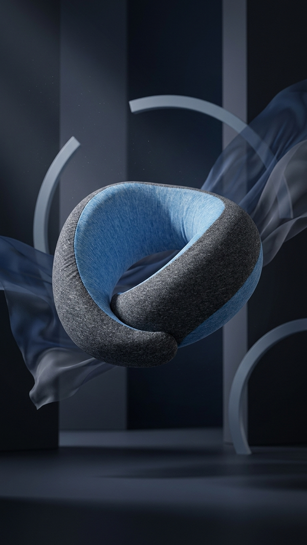 The Cloud Rest U-shaped memory-foam neck pillow in grey with a blue inner cushion