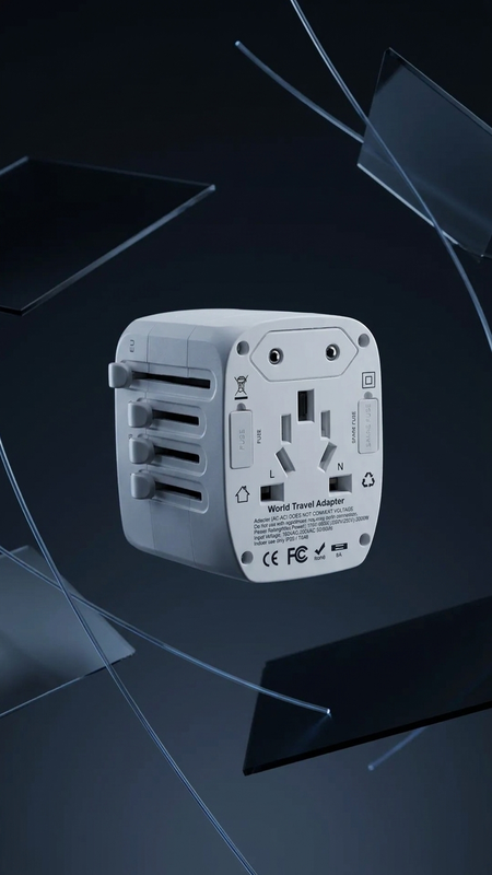 A white universal travel adapter floating against a dark, reflective background with abstract glass-like shapes.